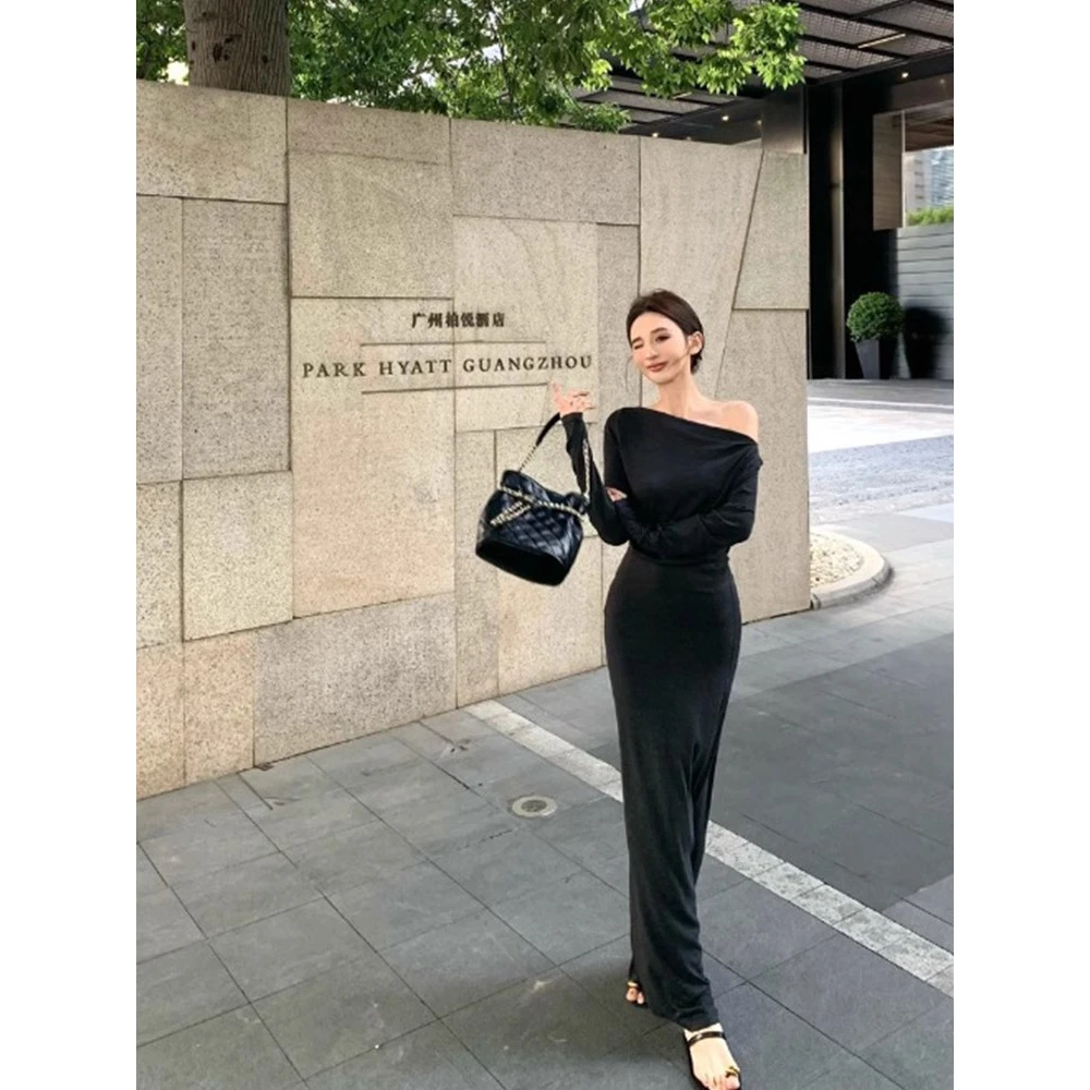 辣妹黑色斜肩长袖连衣裙女装春季修身气质长裙显身材收腰包臀裙子