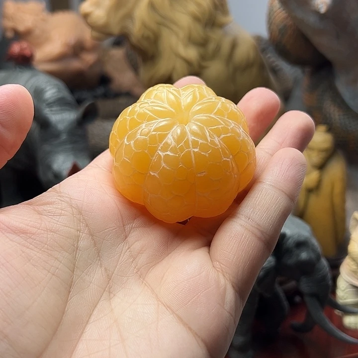 辽宁石橘子手把件