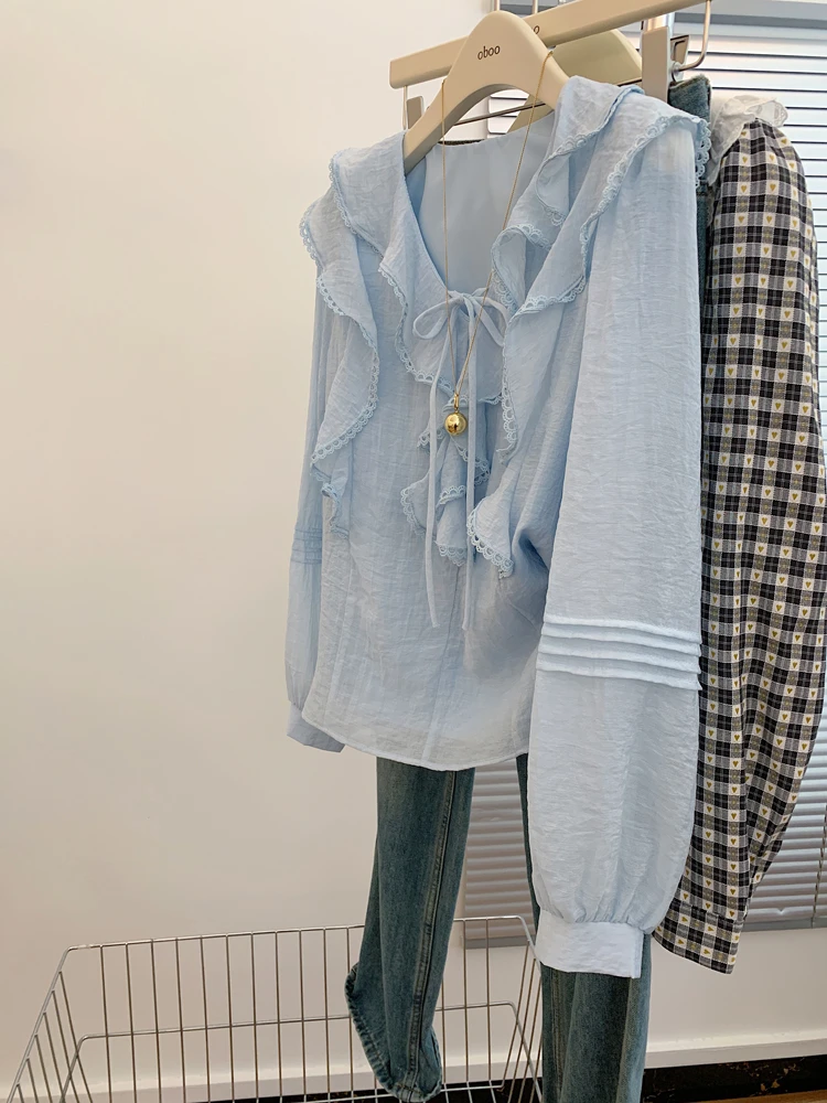 蓝色蝴蝶结衬衫上衣2025秋季设计感小众独特超好看漂亮洋气小衫女