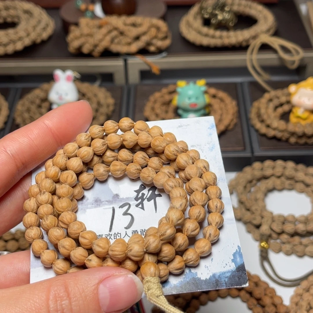 开***孩吊坠柏香籽/百香籽