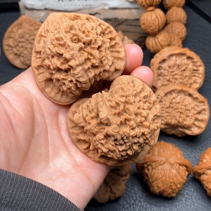 桃核把件全品52官帽