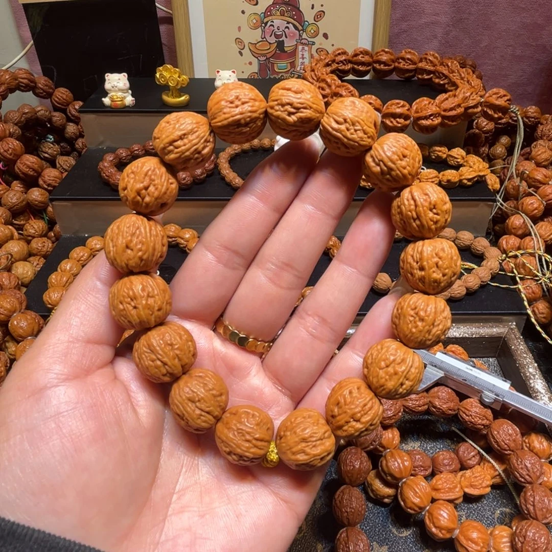 棋***手手串文玩核桃精品