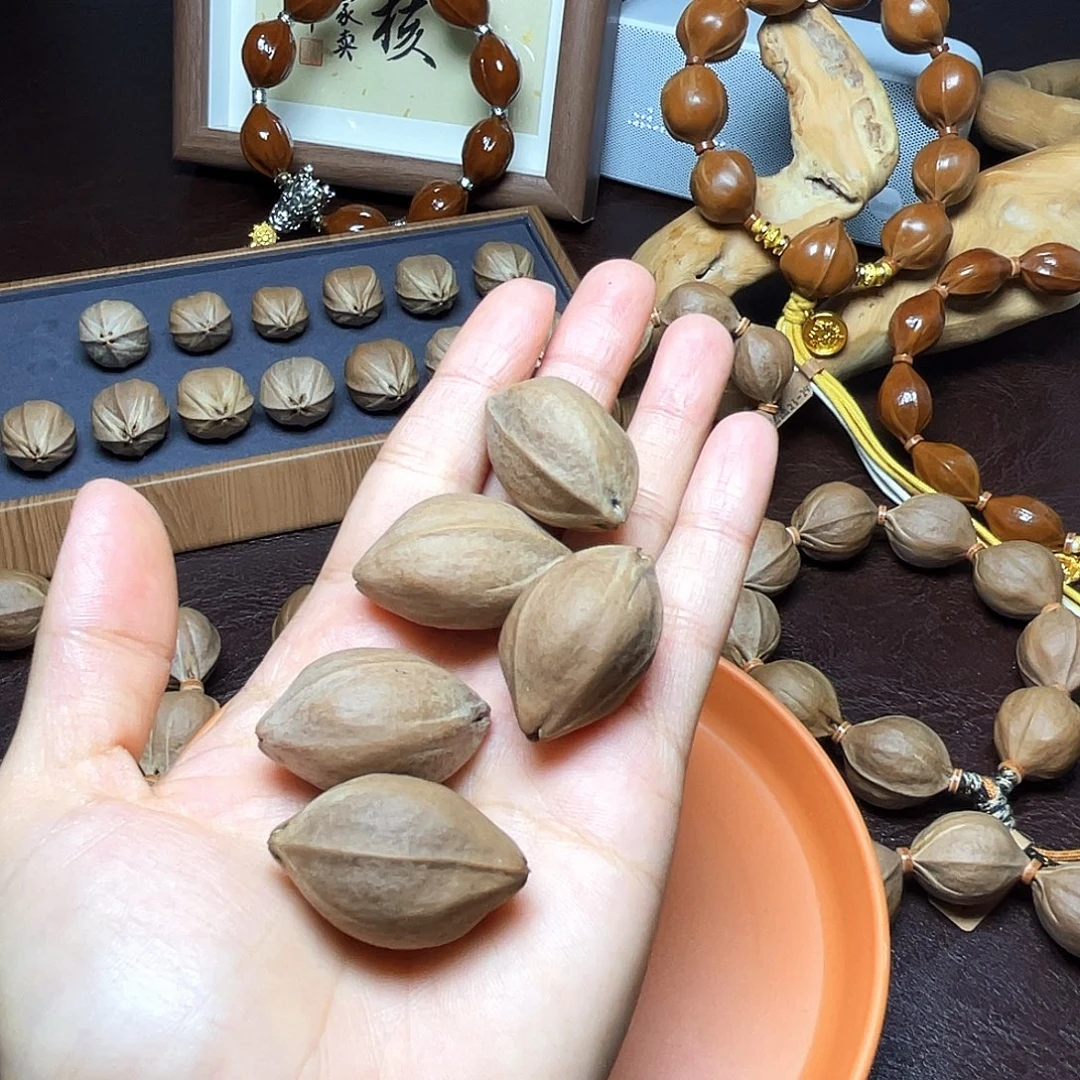 洛***神手串橄榄核梅林铁核21*32