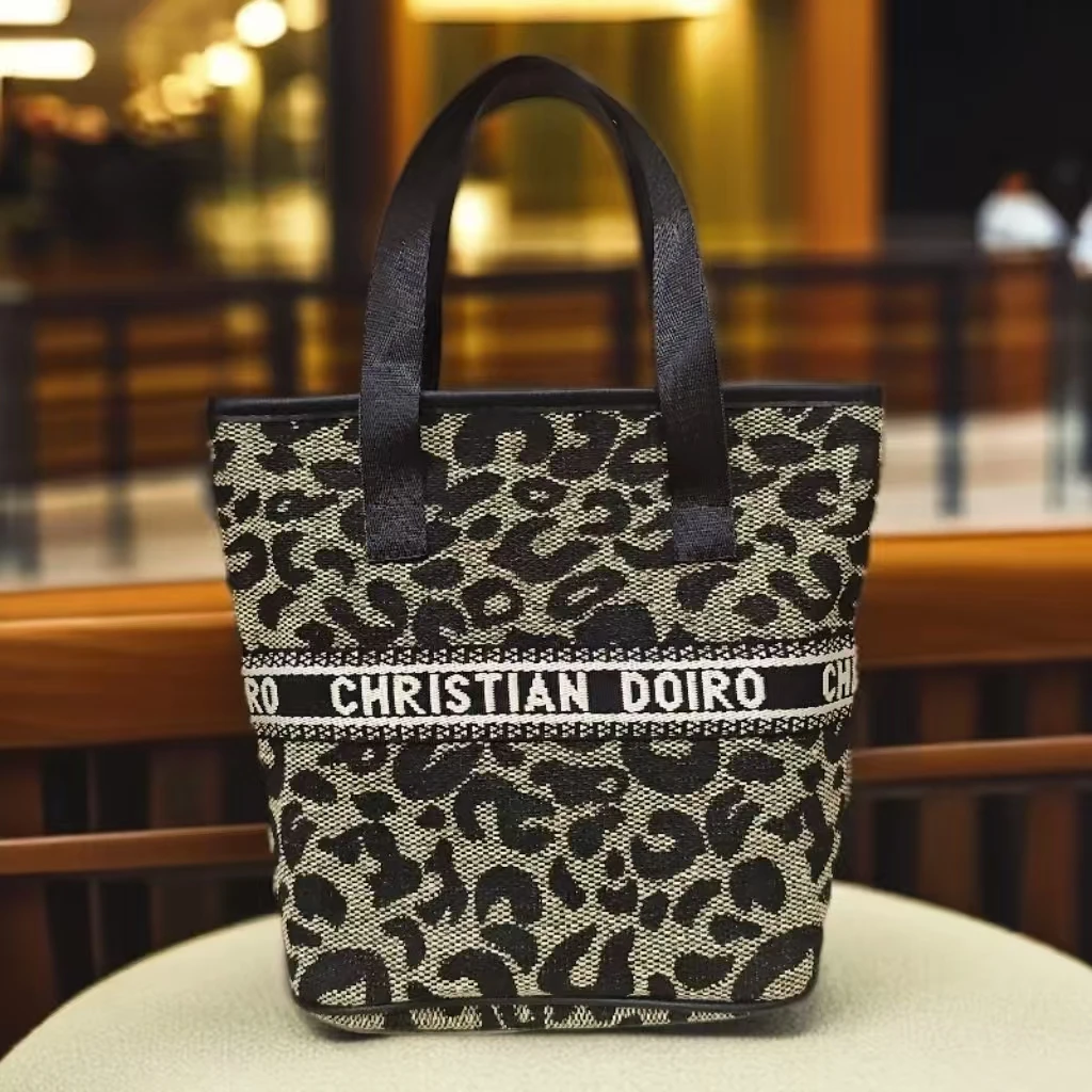 【精选】时尚豹纹水桶拎包 长25高25宽15厘米