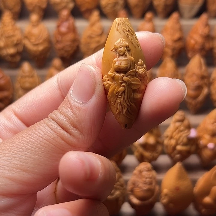 橄榄核吊坠阡**墨橄榄核