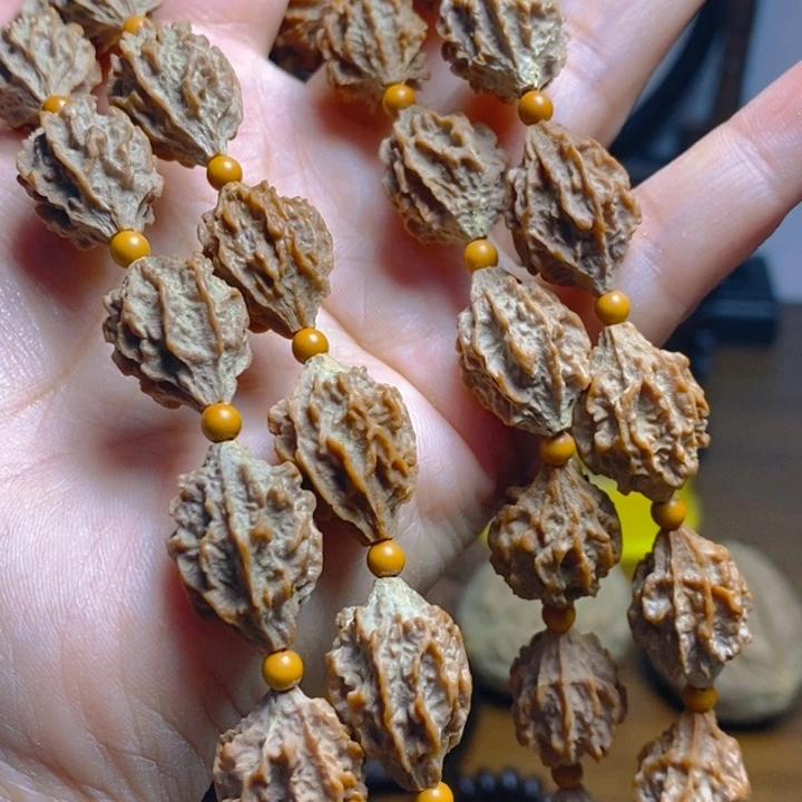 野生麒麟眼橄榄核脖挂36颗