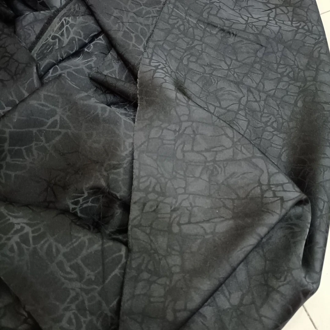 2025新款油龟黑色龟裂纹面料旗袍连衣裙手工服装汉服吊带辅料布料