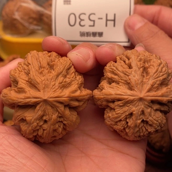桃核把件粗筋44….