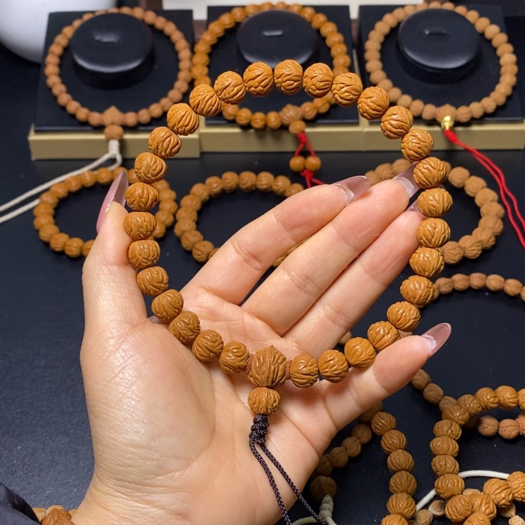 用***9桃核吊坠秦岭文玩