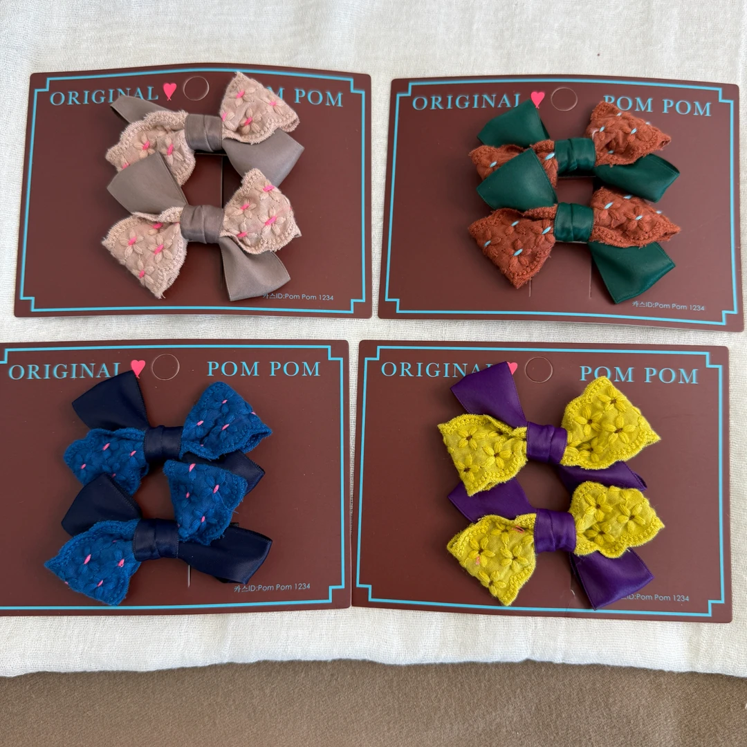 韩国original pom pom2025秋冬款缎面钩织花朵拼色蝴蝶结鸭嘴夹