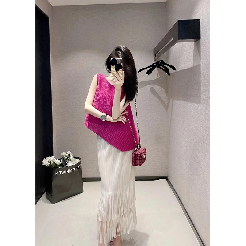 2024夏季新款不规则设计感无袖上衣女搭配高腰超好看流苏半身裙