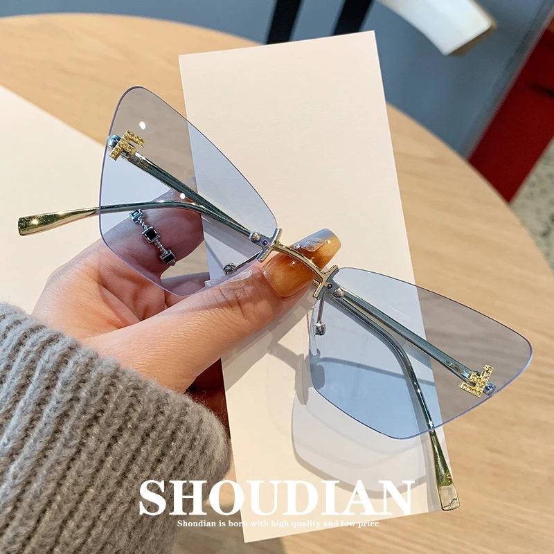 新款猫眼墨镜字母F镶钻太阳镜女高级感无框金属太阳眼镜男ins高档