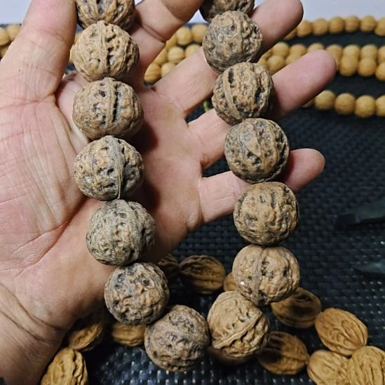 逍***童吊坠文玩核桃纯野生山核桃