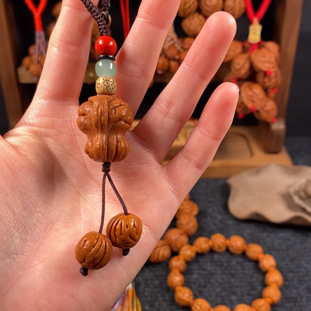 吊坠桃核桃枭手串