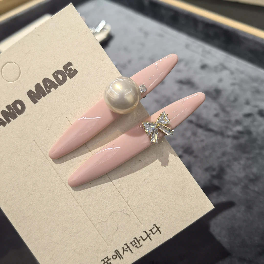 F059粉色单珠蝴蝶结闪闪边夹一对