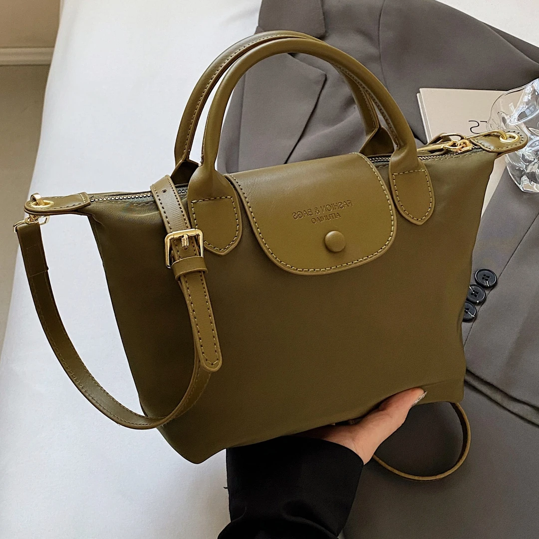 定制轻奢休闲高级感包包女式2024新款轻便尼龙布饺子包通勤斜挎包