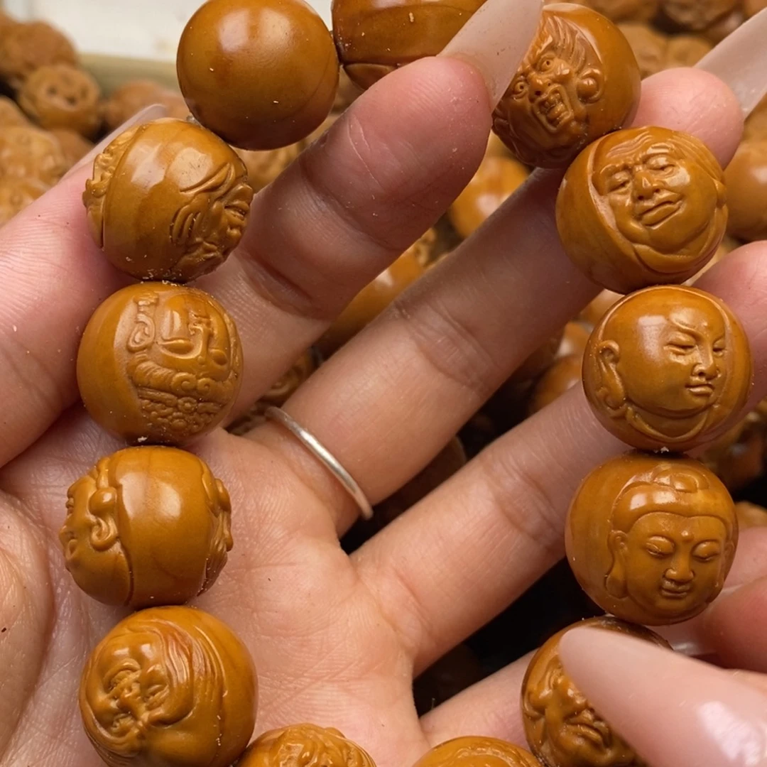 T***y手串橄榄核反油特价