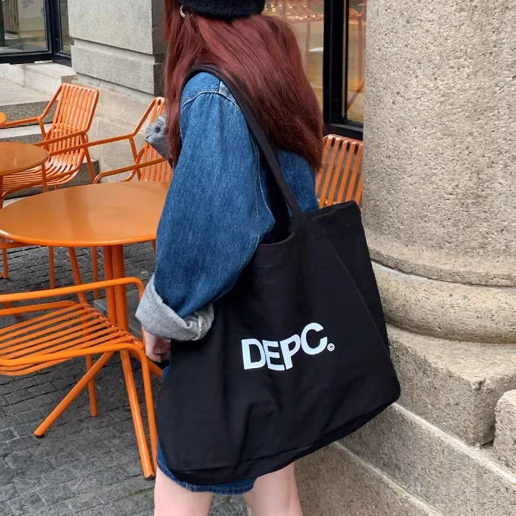 小众设计帆布包女夏2025新款休闲学生补习袋大容量时尚字母托特包