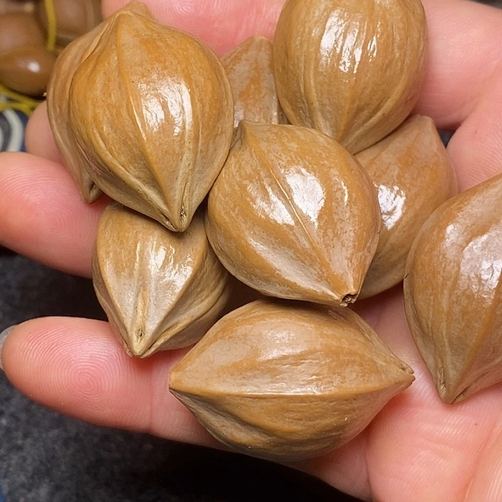 橄榄核手串2.4正四花44号