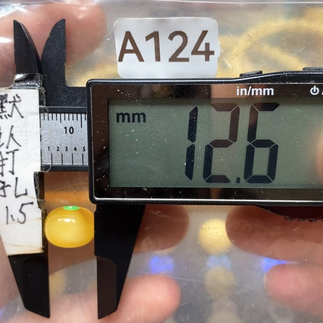 未镶嵌蜜蜡裸石金白花带溶洞