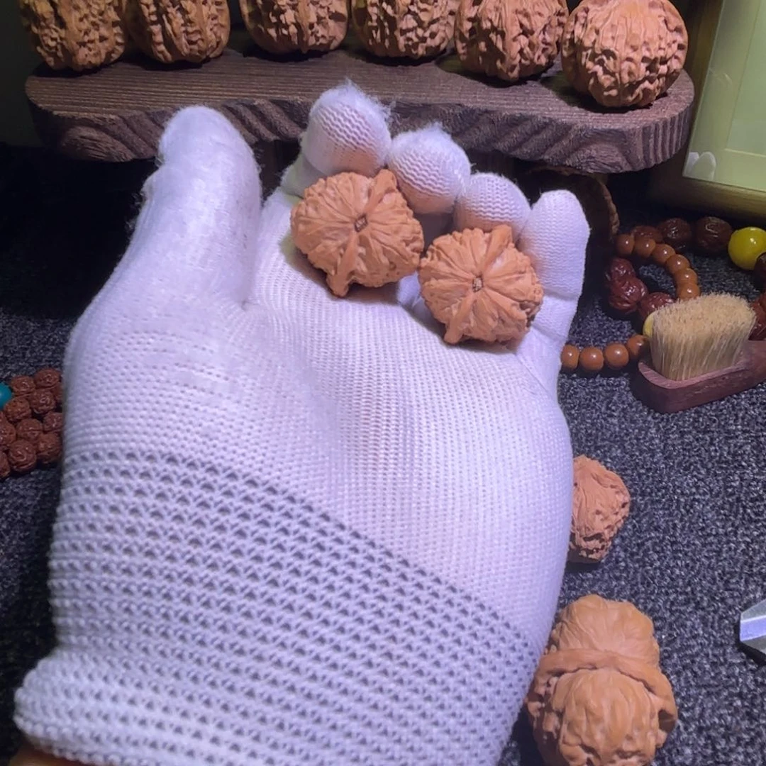 星***尘文玩核桃把件野生燕山明珠30边