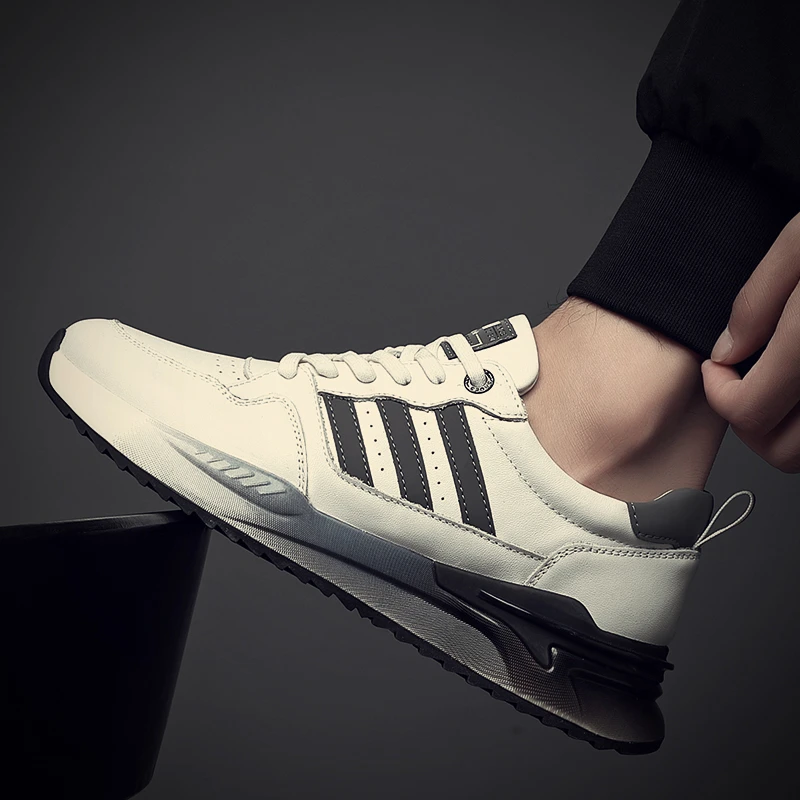 新款真皮时尚休闲男鞋头层牛皮韩版拼色系带百搭透气运动鞋2001