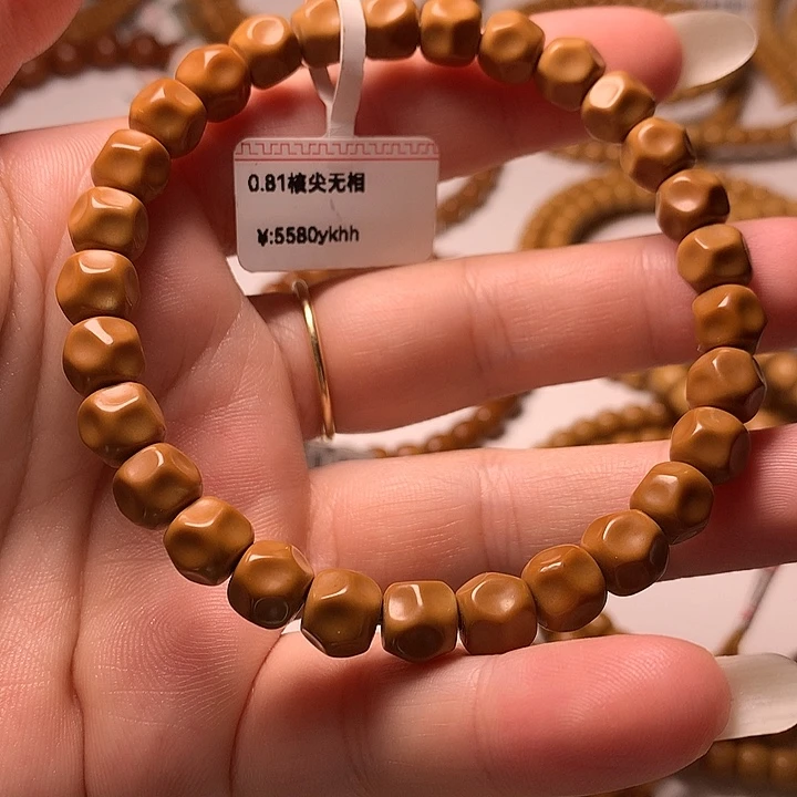 杨***堂吊坠橄榄核核尖无相