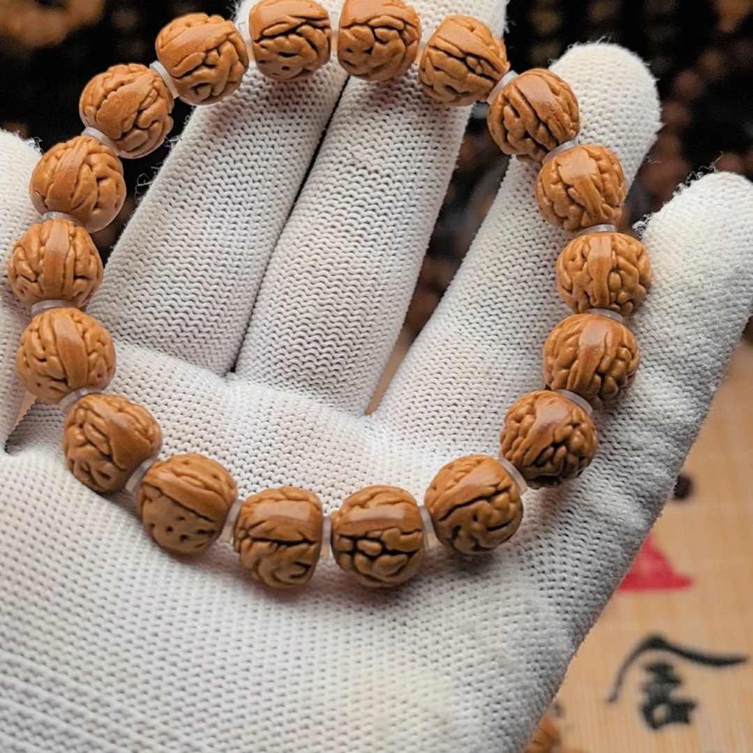 吊坠桃核肉纹大肠手串