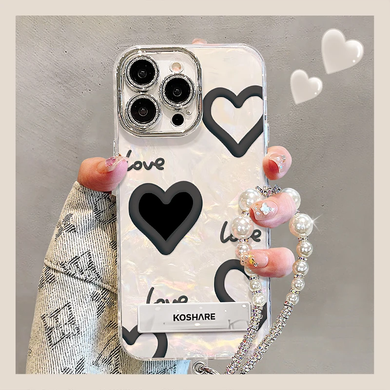 黑色爱心适用苹果15华为vivo/oppo小米iPhone16精孔贝壳纹手机壳
