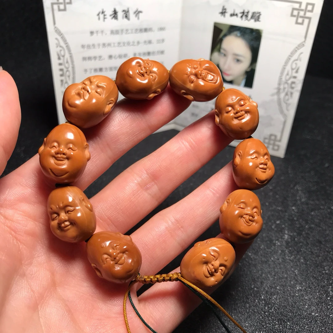 铁核橄榄核雕刻小籽人生百态手串尺寸1.5*1.9cm小淘气文玩男女款