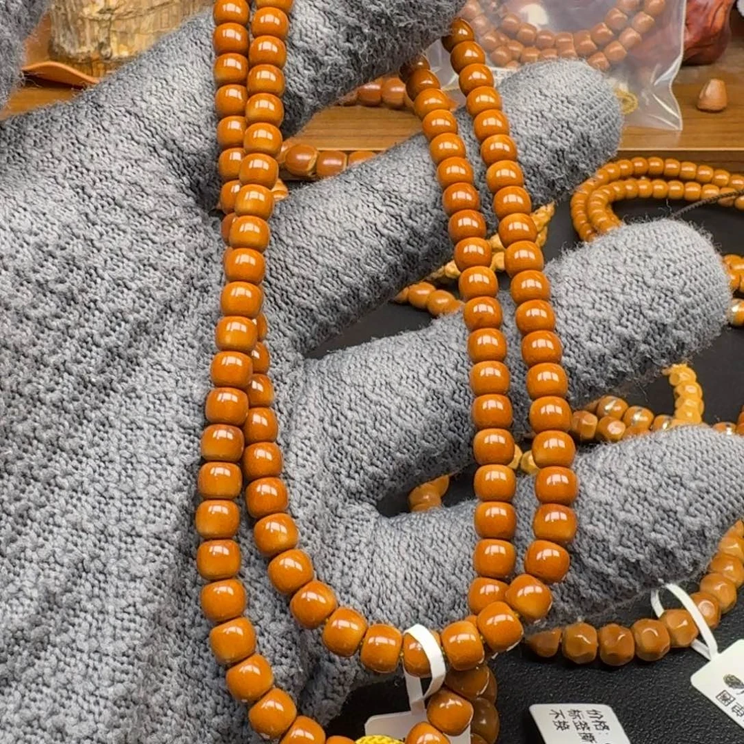 晓***明手串/手链橄榄核6.1老挝核尖108红料微白