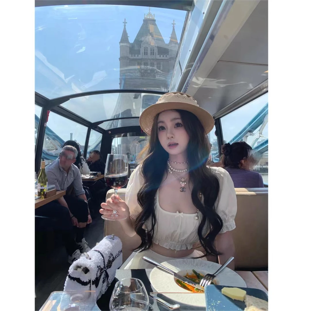 曼曼【白茶娃娃】浪漫甜美女U领蝴蝶结泡泡袖上衣