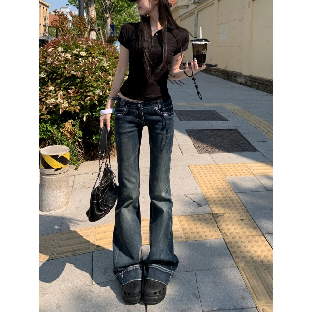 复古简约设计感深蓝微喇牛仔裤女2025新款辣妹显瘦低腰修身微喇裤