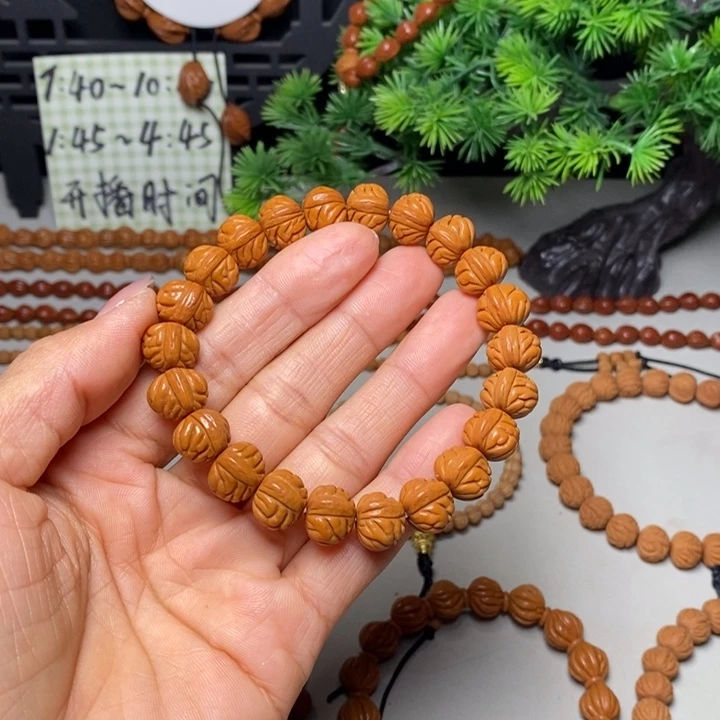 桃核手串凤羽手串