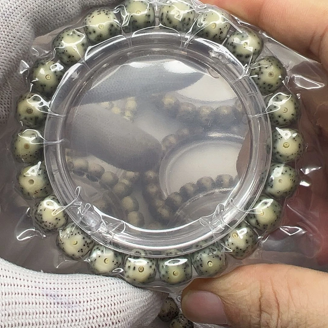 手串星月菩提10×9绿包白黄金瞳  895
