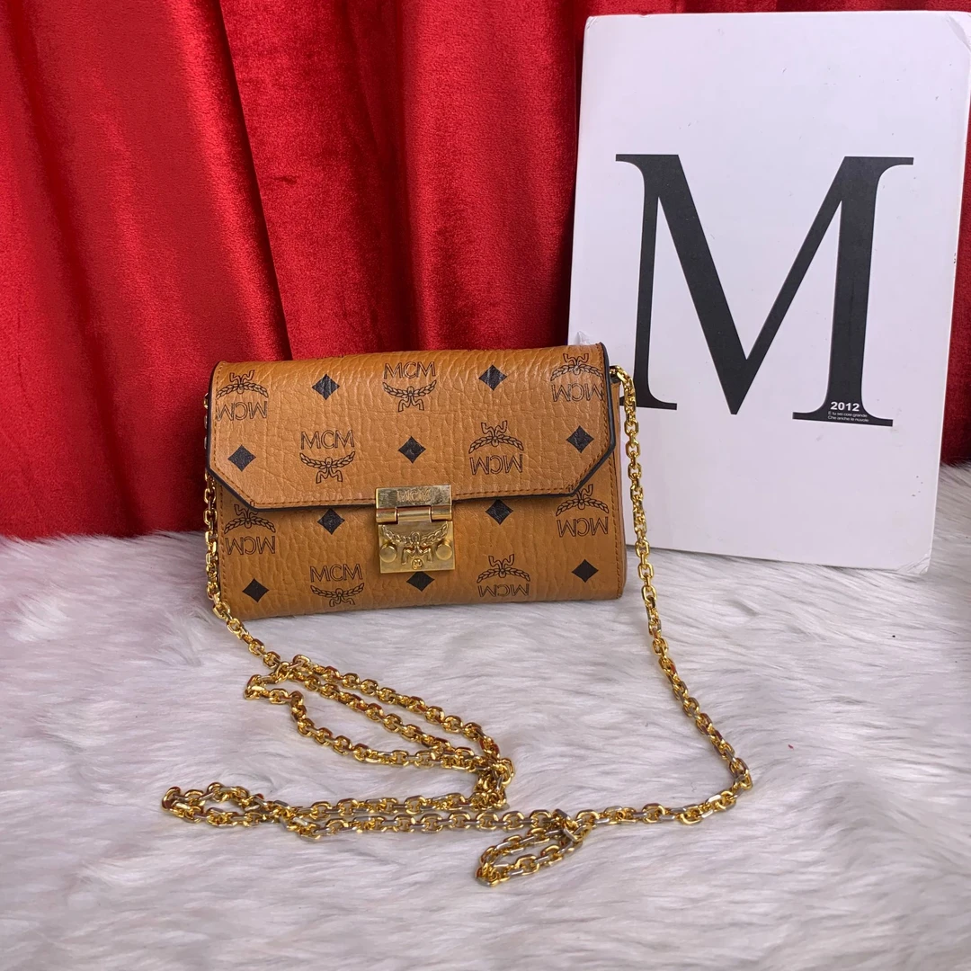 95新 MCM 干邑色斜跨包/WJ09507002/7002