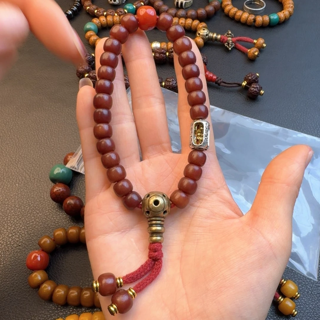 风车木（黑檀木）模**人菩提根