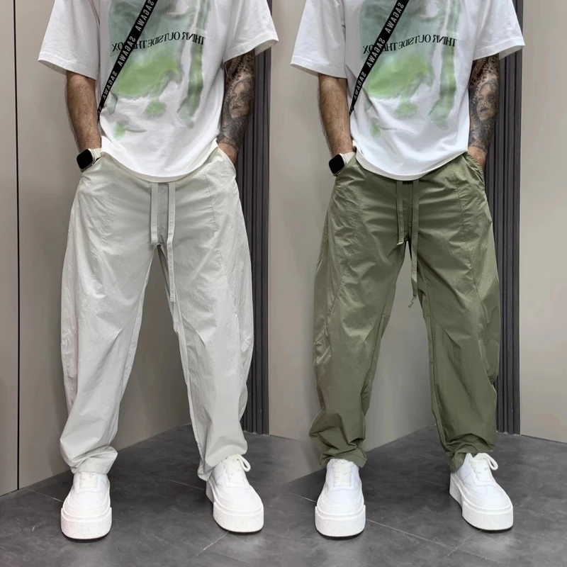新款男士男生简约宽松阔腿工装哈伦裤潮流网眼透气纯色弯刀休闲裤