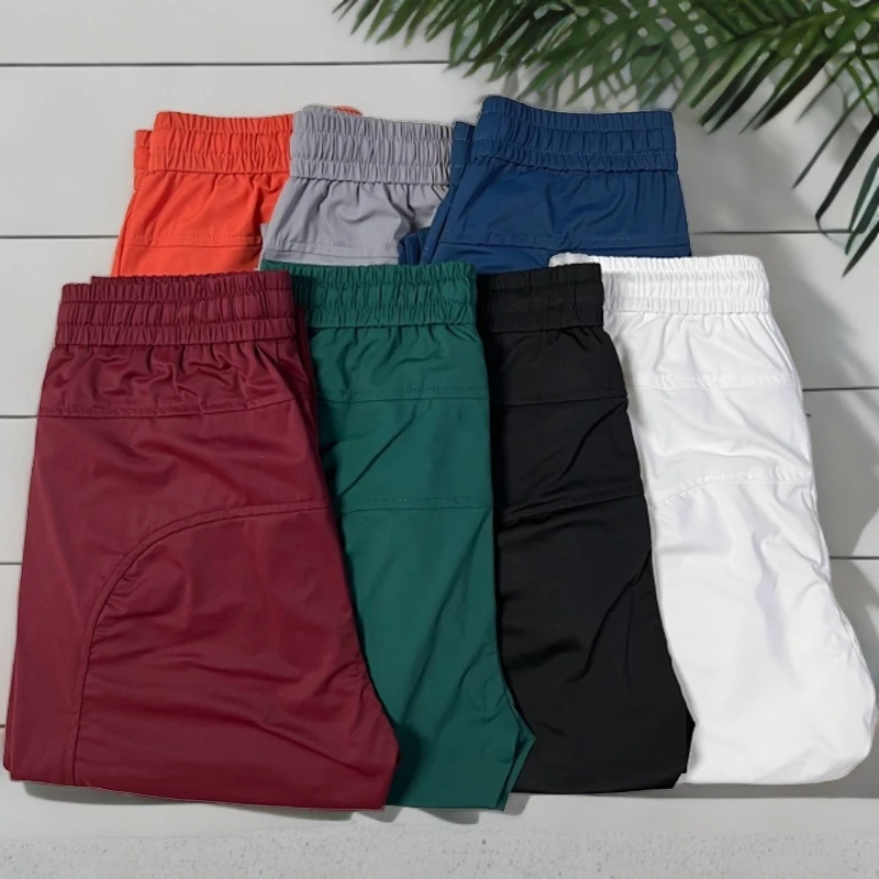 夏季薄款冰丝男士休闲裤高弹力速干面膜裤冰爽透气束脚运动裤