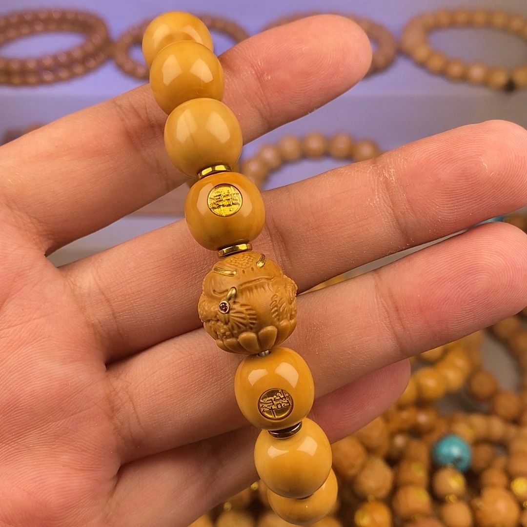 曹****猴头核桃手串全品老型金蝉