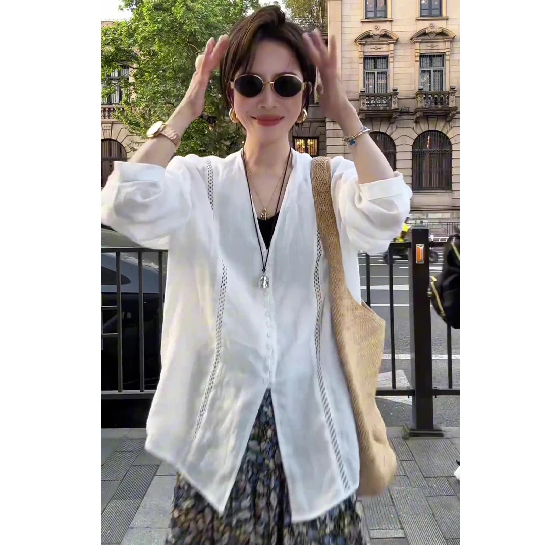 夏季镂空V领拼接白色衬衫女2025新款设计感气质薄款防晒长袖上衣
