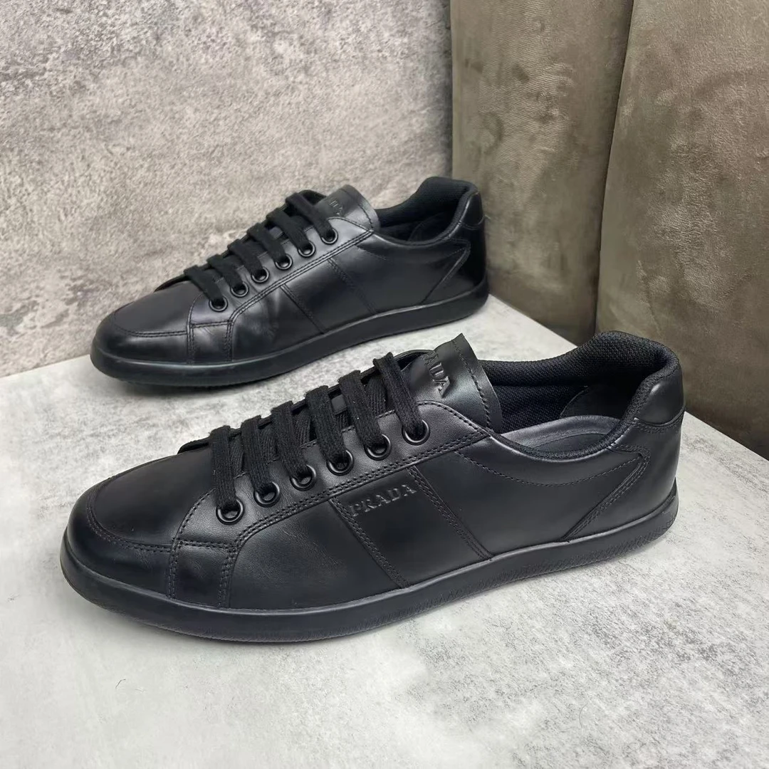 95新 Prada/普拉达 黑色皮质侧边印花logo舒适百搭板鞋/40.5码