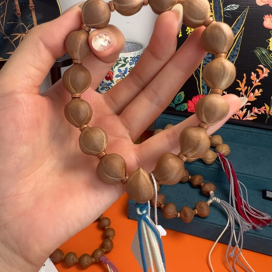 橄榄核手串蜜桃臀