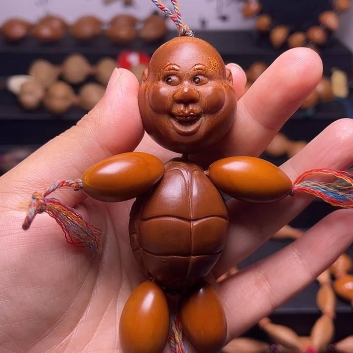 橄榄核把件富甲一方盘小人，