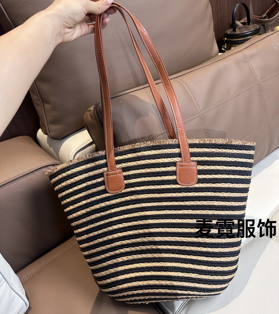 简约条纹草编包女2025新款夏季休闲旅游沙滩包大容量通勤单肩包