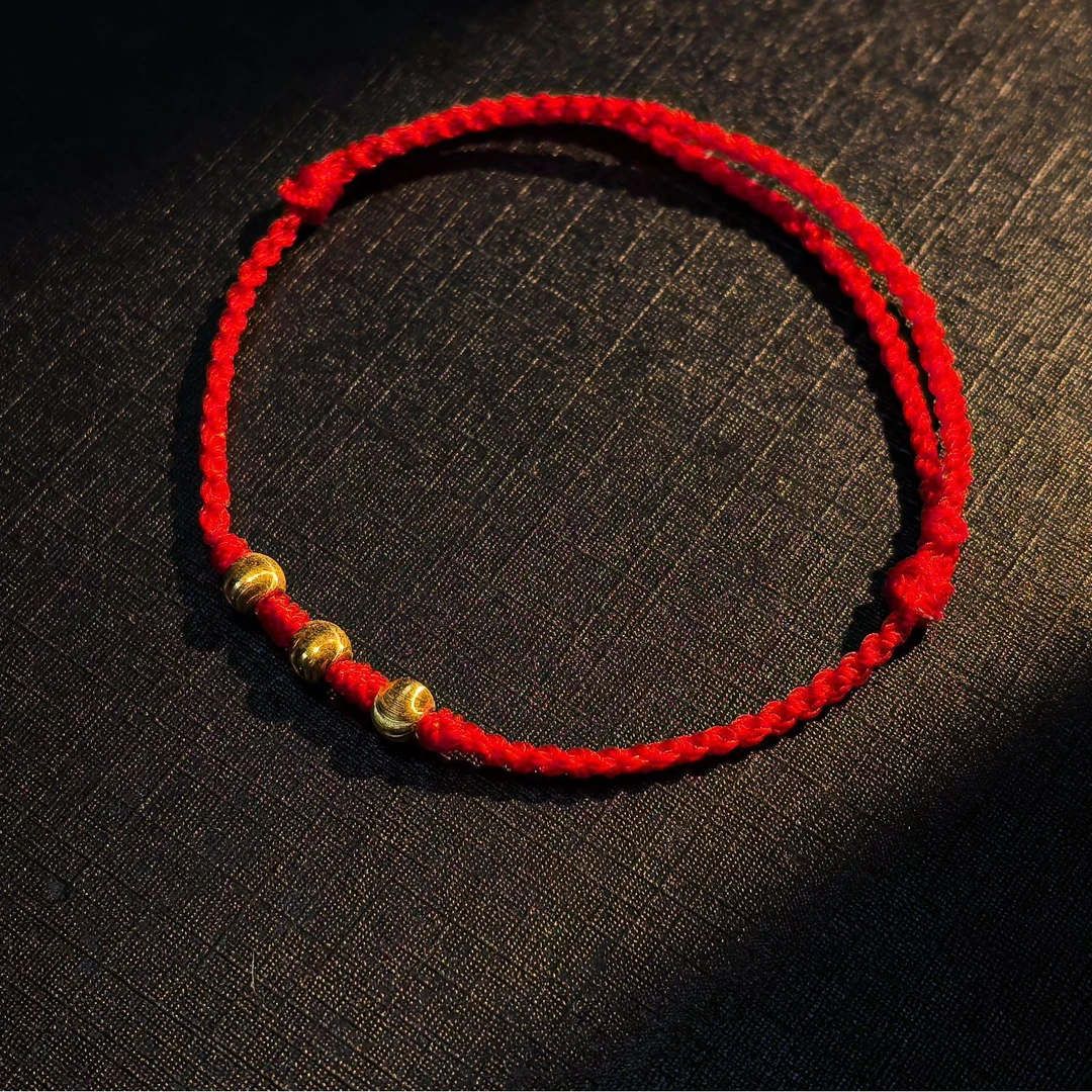 足金卡4爆闪猫眼珠红绳 2512G49