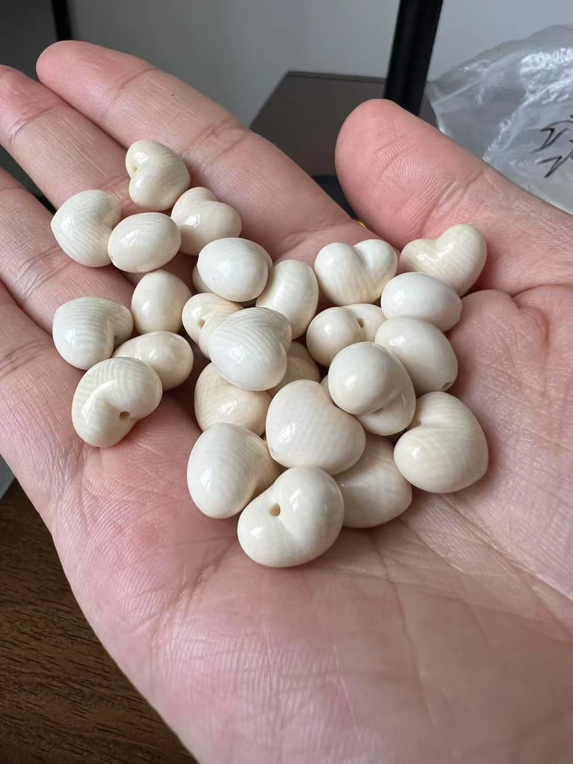 【百亿饰品】 天然猛犸牙【12mm16mm】满纹爱心  支持鉴定 假一罚十