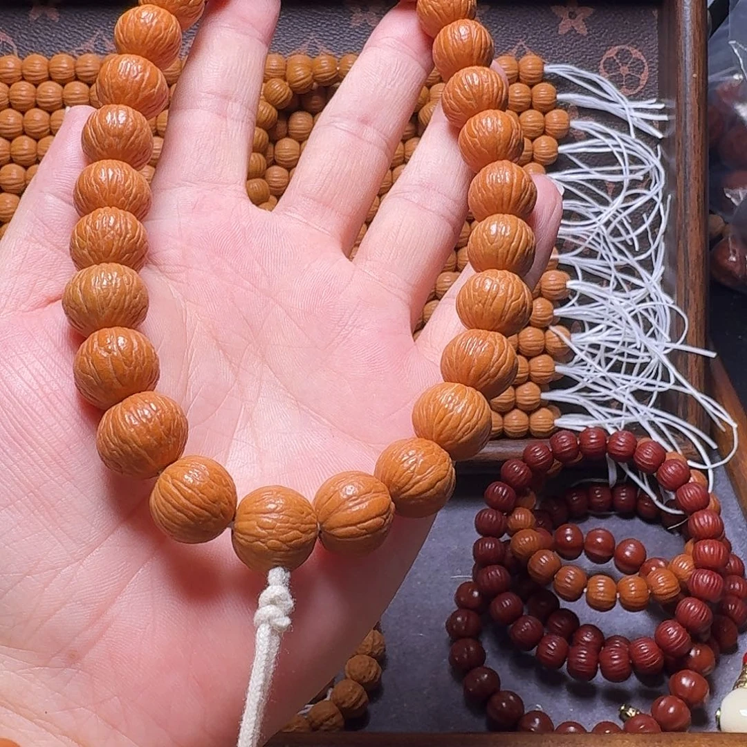 猴头核桃吊坠凤羽手持