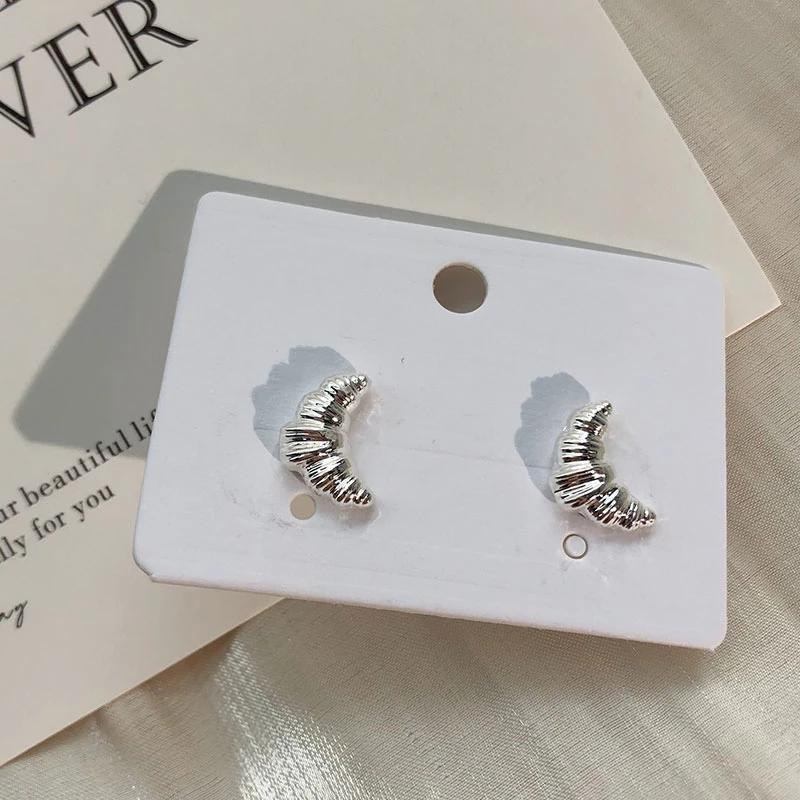 925银耳饰 铜合金925银针气质耳环小众设计感牛角包耳钉女ins