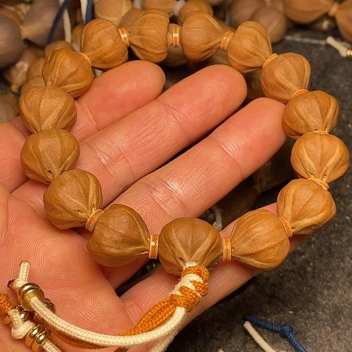 橄榄核手串1.6蒜头四花手串20号